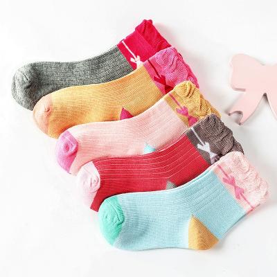 China Fashionable alphabet children's spring and autumn large boy boy sports cotton autumn and winter medium tube girl's antibacterial casual socks for sale