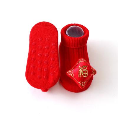 China 2022 New Year Antibacterial Red Baby Socks Gift Box Cartoon In-tube Warm Non-slip Baby Socks Set for sale