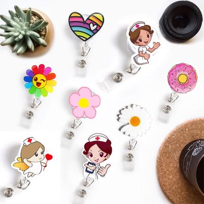 China 2021 New Design High Quality Acrylic Retractable Nurse Badge Reel Fashion Daisy Love Heart With Button 3.5cm*5cm for sale