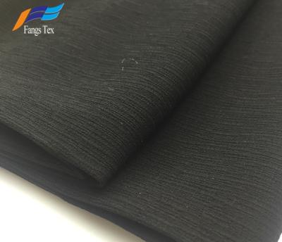 China Hot Selling Anti-static cheap polyester dobby bark crepe pine skin fabric 100% formal black for abaya for sale