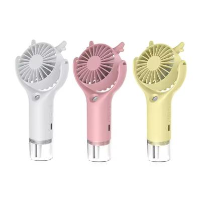 China 2025 New Arrival Portable Cooling Water Spray Handheld Misting Fan Mini Wireless Mini Portable Hand Fan Rechargeable Mist Fan for sale