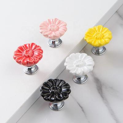 China Ceramic Chrysanthemum Shape Minimalist Furniture Hardware For Sideboards Pull Handle Handle Color Hardware OEM Customized Handle for sale