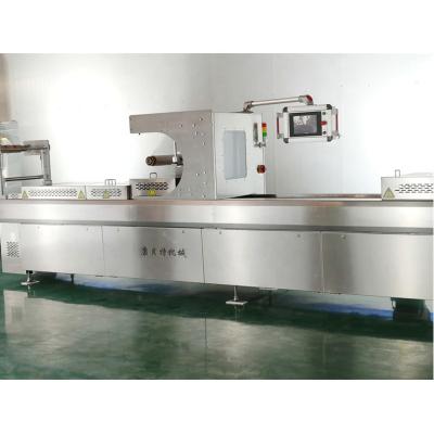 China Food Chicken Skin Sealer Wrapping Automatic Thermoforming Vacuum Packing Machine for sale