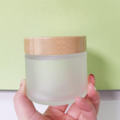 China 200g Clear Gel Glass Cosmetic Jars For Cosmetic Containers And Packaging With Bamboo Container Wholesale Cream Gel Lid Glass Jars for sale