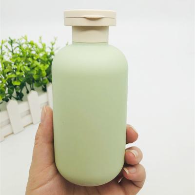 China HDPE Cosmetic Clear Cream Lotion Bottle For Shampoo 300ml Plastic Bottles Set With Cosmetic Packaging Green Color for sale