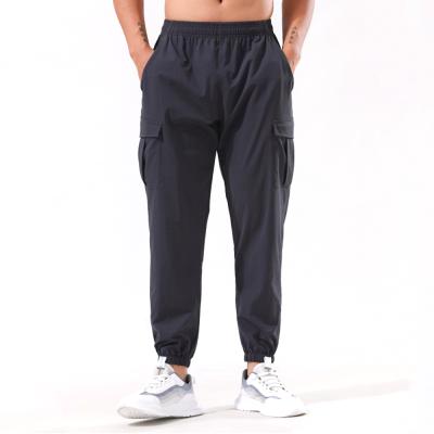 China Anti-Wrinkle Men Fitness Casual Wear Pants Sports Trousers With Pockets for sale