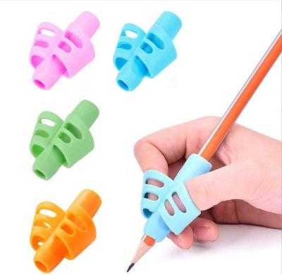 China Eco-Friendly School Pencil Holder Rubber Pencil Grip Kids Pen Grip Corrector for sale