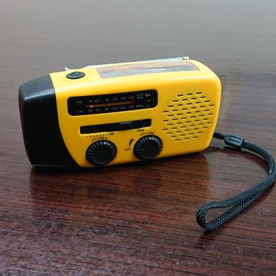 China Cranking radio with light & Solar Panel Flashlight Hand Rolling Generator Mobile Phone Charging Emergency Radio for sale