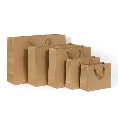 China Recyclable Paper Bag Good Quality Kraft Paper Bag Colorful Environmental Friendly Printing For Clothes for sale