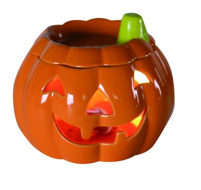 China Electric Ceramic Oil Candle Burner Wax Heater/Oil Burner Pumpkin Shape Fragrance Warmer Lamp for sale