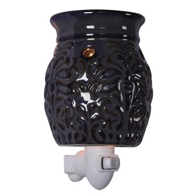 China CUSTOMIZED Artificial Ceramic Decorative Wall Plug In Wax Pie Heater for sale