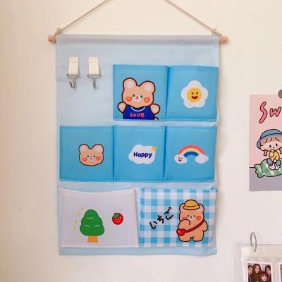 China Eco-friendly Cute Wardrobe Door Bedside Wall Bag Net Red Red Hanging Cloth Storage Bag for sale