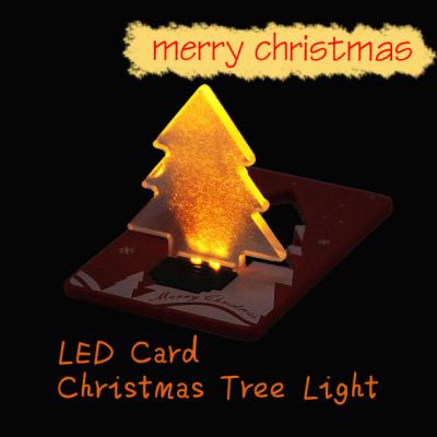 China Christmas Decoration Pocket Folding Xmas Tree Shape LED Light for sale