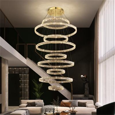 China Modern Post Modern Luxury Pendant Rings of Light LED Crystal Fixtures Round Chandelier Lights for Stairs for sale