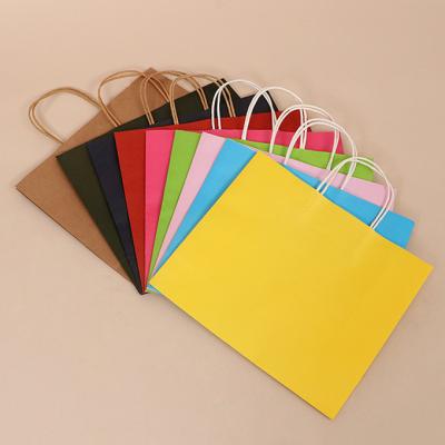 China Bolso de empaquetado del regalo de encargo de Logo Printing Reusable Kraft Paper con la manija en venta