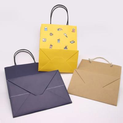 Κίνα Προσαρμοσμένο εκτυπωμένο λογότυπο Kraft Paper Packaging Bag Gift Crafts Shopping Βιοδιασπώμενη χαρτοσακούλα με λαβή προς πώληση