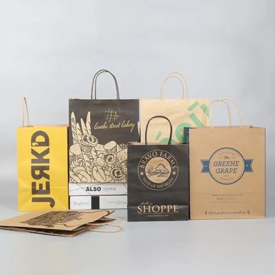 China Bolsa de papel Kraft de compras de color blanco marrón impreso a medida con mango Restaurante Bolsa de comida rápida para llevar en venta