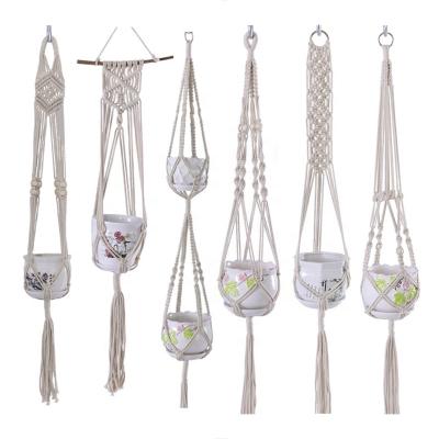 China Home Decor Macrame Plant Hangers Rows Indoor Different Handmade Cotton Rope Indoor Hanging Flower Pots Rack Planter Wall Shelf Boho Home Decor Macrame Plant for for sale