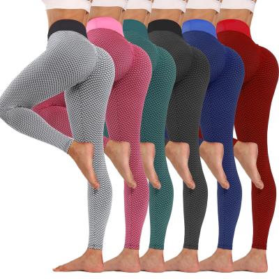 China Breathable Diet Bands Gym Fitness Push Up Clothing Seamless High Waist Women Girl Yoga Pants Pantyhose Grid Yoga Pants for sale