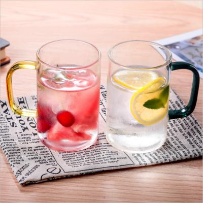 China Outdoor Wholesale Glass Juice Tea Cup With Colorful Handle for sale