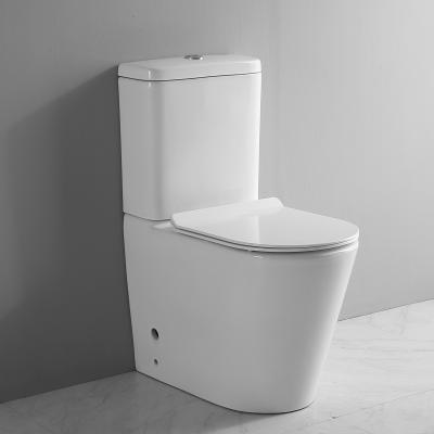 China Height White Floor Rimless P-Trap Comfort Double-Flow Hotel Style Color Flush Back to Wall Bathroom Ceramic WC Toilet for sale