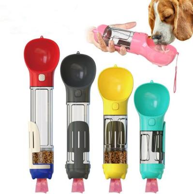 China Wholesale Pet Automatic 4 in 1 Portable Dispenser Dog Food Drink Cup Poop Bag Cat Water Bottle with Scoop for Travel for sale