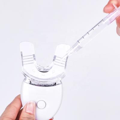 China Effective Whitening Tooth Mini Led Cold Light Teeth Whitening Kit Rechargable Wireless Uv Teeth Home Whitening Kit for sale