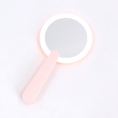 China NEW Hot Sale Cakes LED Lighted Socket Lighted Small Pocket Cosmetic Mirror With On-Off Magnet for sale