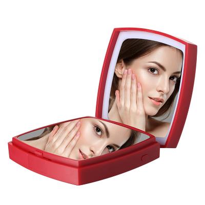 China Lighted Portable Double Sided Folding Makeup Mirror With 3x Magnification For Girls for sale