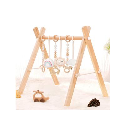 China EB Non-Toxic Activity Newborn Gift Set Sensory Toy Wooden Baby Gym Made in China for sale