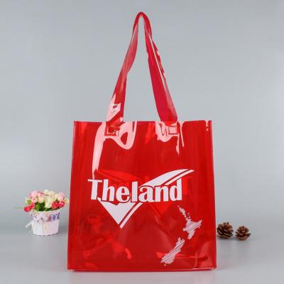 China Custom Size XL Transparent Red PVC Handled Bags Tote Shopping Bag With Silk Screen Printing for sale