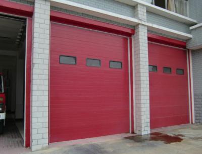 China Gray Steel Insulated Sectional Commercial Garage Doors Industrial Vertical Lift Door for sale