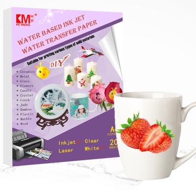 China Widely Clear Laser Water Transfer Paper A4 White Water Slide Decal Paper For Ceramic Conch for sale