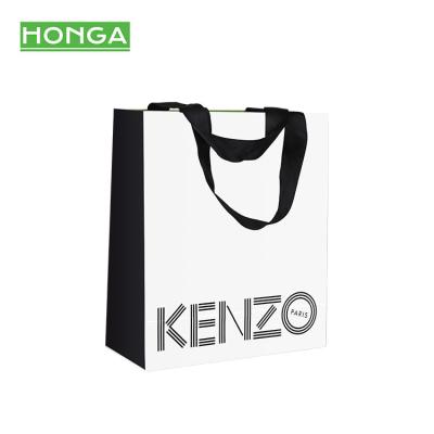 China Other High Quality Custom Fashion Jewelry Gift Packaging Paper Bag White Paper Foldable Gift Shopping Bags With Your Own Logo for sale