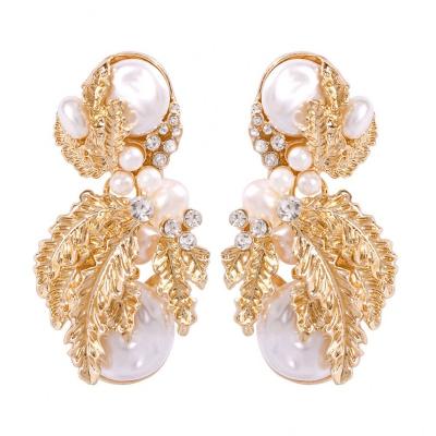 China Vintage New Design Wholesale Gold Metal Leaves Pearl Rhinestone Statement Earrings For Women for sale