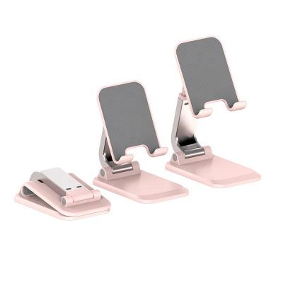 China Jiesen Plastic Material Pink Color Adjustable Portable Foldable Anti Slip Mobile Phone Holder Funny Stand for sale