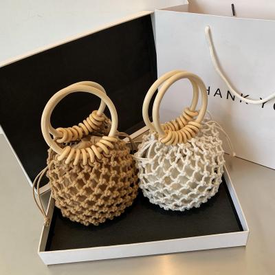 China 2021 High Quality Fashion Cotton Rope Drawstring Round Handle Woven Bucket Purse Bags Mini And Handbags Women Summer Beach Bags for sale