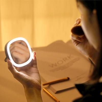 China 2020 new product 800mah portable lighted makeup mirror with led lights usb led travel makeup mirror with led lights makeup for sale