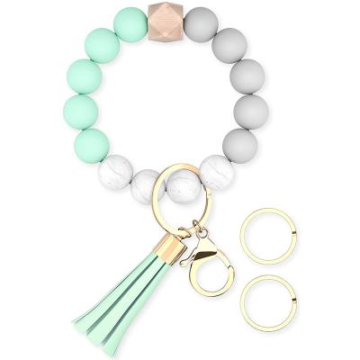 China Key Chain Beaded Silicone Wristband Silicone Wristband Key Chain Key Chain With Tassel For Women for sale