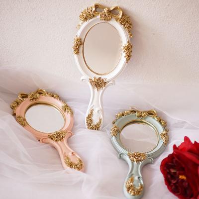 China Customized Beauty Makeup Handheld Makeup Mirror Customized Logo Beauty Salon Handle Mirror for sale