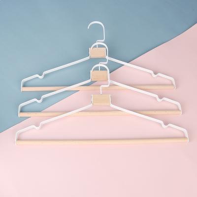 China Factory direct sale minimalist white metal hanger with natural wood pants bar hanger for sale