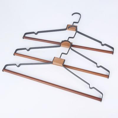 China Factory direct sale metal hanger minimalist with natural wood pants bar hanger for sale