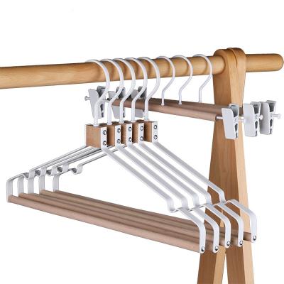 China Luxury Heavy Duty Space Saving Metal Hangers Matt Finish Metallic Coat Flat Smooth Hangers with Wooden Trouser Bar for sale