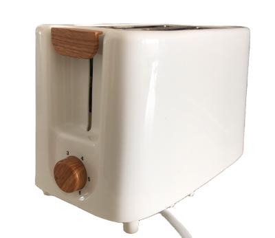 China Hotel Design Wooden Plastic Cool Touch Toaster Automatic Bread Toaster for sale