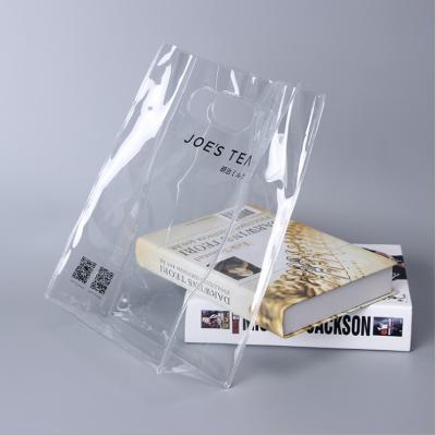 China Custom Logo Clear Printed Moisture Proof Stand Up PVC Bag With Handle For Wine Packaging for sale