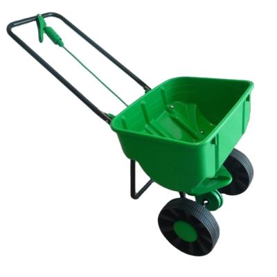 China Manual Traction Seeder New Arrival Metal Seed Planter Fertilizer Spreaders TC2027 for sale