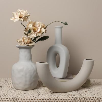 China Tropical Wholesale Unique Geometric Ceramic Vase INS Wine Cabinet Dining Table Porcelain Vases For Home Decor for sale