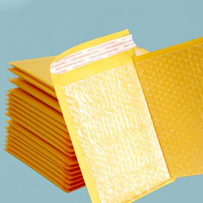 China Recyclable Custom Printed Yellow Kraft Paper Bubble Mailing Bag Courier Express Logistics Packaging Bag Thickened Bubble Envelope Bag for sale