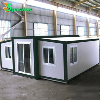 China Traditional Custom Container House With Prefab Wheels Spain Sandwich Panel Rooms for sale