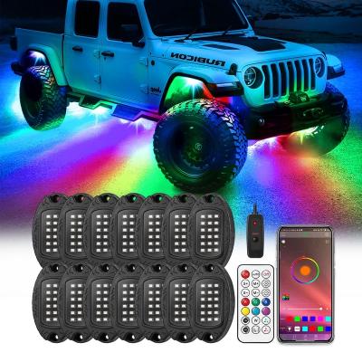 China 256 Chasing Effect Modes 14Pods Rock Lights 4x4 Rock foo twell lights RGB Underglow Neon Rock Lights Wireless Remote Truck Parts for sale